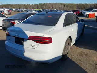 2018 Audi A8 L with VIN WAU44AFD7JN000598, listed as a IAAI auction lot 41313616 with 112,811 mi miles. Bid and sale history available at carsss.com. Image 4.