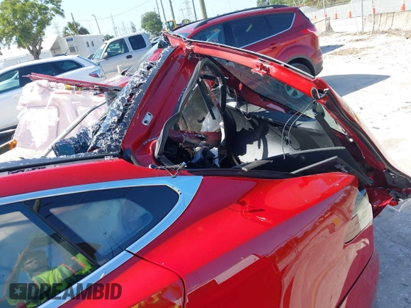 2016 Tesla Model S 90D with VIN 5YJSA1E27GF167442, listed as a IAAI auction lot 41989371 with Not Provided miles and . Bid and sale history available at DreamBid. Image 12.