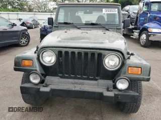 1998 Jeep Wrangler Sahara with VIN 1J4FY49S2WP707318, listed as a Copart auction lot 59508635 with 144,948 mi miles and Clean title. Bid and sale history available at DreamBid. Image 5.
