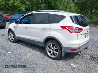 2013 Ford Escape Titanium z VIN 1FMCU9J9XDUA10838, wystawiony jako IAAI lot #42702521 z przebiegiem 86 815 mil mil oraz . Historia ofert i sprzedaży dostępna na DreamBid. Obrazek 3.