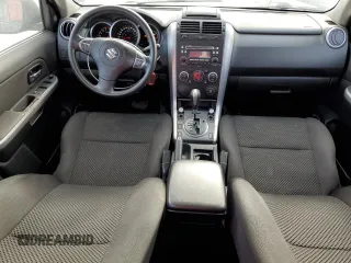 2012 Suzuki Grand Vitara Premium z VIN JS3TD0D29C4100139, wystawiony jako Copart lot #49163115 z przebiegiem 271 080 mil mil oraz Nie do naprawy. Historia ofert i sprzedaży dostępna na DreamBid. Obrazek 8.
