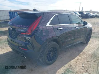 2020 Cadillac XT4 FWD Luxury z VIN 1GYAZAR48LF151119, wystawiony jako IAAI lot #41327430 z przebiegiem 62 704 mil mil oraz . Historia ofert i sprzedaży dostępna na DreamBid. Obrazek 4.