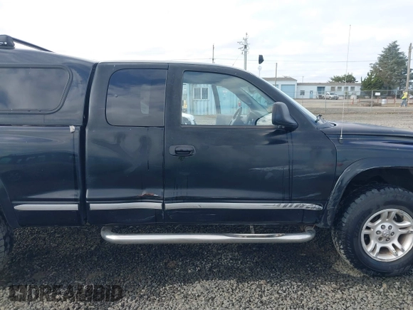 2004 Dodge Dakota SLT with VIN 1D7HG42N94S618531, listed as a IAAI auction lot 41741467 with 202,422 mi miles. Bid and sale history available at carsss.com. Image 6.