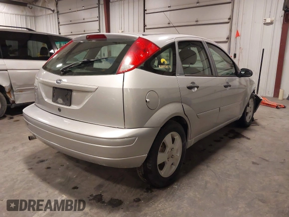 2007 Ford Focus S with VIN 1FAFP37NX7W330802, listed as a IAAI auction lot 41663895 with 147,015 mi miles and . Bid and sale history available at carsss.com. Image 4.