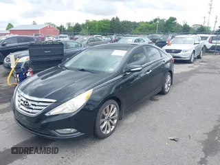 2012 Hyundai Sonata SE with VIN 5NPEC4AB7CH408636, listed as a IAAI auction lot 42188211 with 197,665 mi miles and . Bid and sale history available at carsss.com. Image 2.
