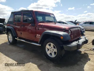 2008 Jeep Wrangler Unlimited X with VIN 1J8GA391X8L592843, listed as a Copart auction lot 53047215 with 239,726 mi miles and Salvage Title. Bid and sale history available at DreamBid. Image 4.