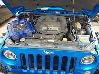 2015 Jeep Wrangler Sahara with VIN 1C4AJWBG9FL663959, listed as a IAAI auction lot 42133900 with 56,253 mi miles and . Bid and sale history available at DreamBid. Image 10.