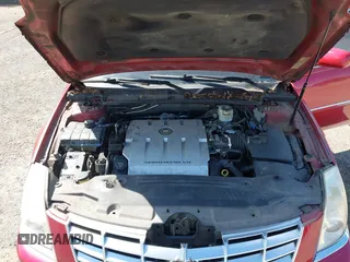 2006 Cadillac DTS 1SC z VIN 1G6KD57YX6U188066, wystawiony jako IAAI lot #42300335 z przebiegiem 110 774 mil mil oraz . Historia ofert i sprzedaży dostępna na DreamBid. Obrazek 10.