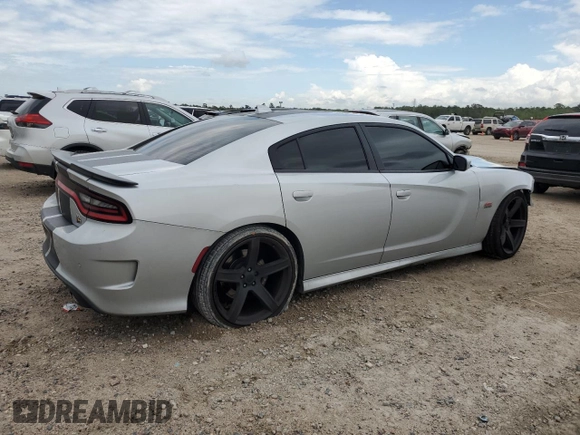 2019 Dodge Charger Scat Pack with VIN 2C3CDXGJ0KH688805, listed as a Copart auction lot 50822835 with 71,827 mi miles and Salvage Title. Bid and sale history available at DreamBid. Image 3.