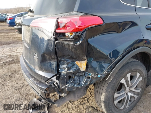 2018 Toyota RAV4 LE with VIN JTMBFREV5JD253342, listed as a IAAI auction lot 41656581 with 243,791 mi miles and . Bid and sale history available at DreamBid. Image 6.