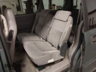 1998 Chevrolet Venture with VIN 1GNDX03E9WD259261, listed as a IAAI auction lot 41552642 with 179,086 mi miles. Bid and sale history available at carsss.com. Image 8.