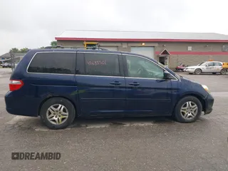 2005 Honda Odyssey EX-L with VIN 5FNRL38725B001662, listed as a IAAI auction lot 42693301 with 161,114 mi miles and . Bid and sale history available at DreamBid. Image 14.