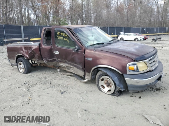 2001 Ford F-150 XL with VIN 1FTZX17211NA94099, listed as a Copart auction lot 50587055 with Not provided miles and Salvage title. Bid and sale history available at DreamBid. Image 4.