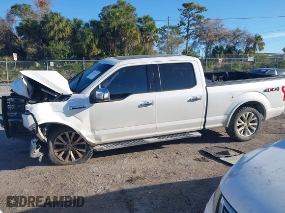 2016 Ford F-150 XLT with VIN 1FTFW1EF4GFA70555, listed as a IAAI auction lot 41733971 with 218,209 mi miles. Bid and sale history available at carsss.com. Image 14.