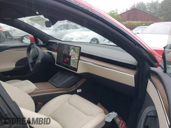2021 Tesla Model S Long Range with VIN 5YJSA1E53MF428488, listed as a IAAI auction lot 42511017 with 68,482 mi miles and . Bid and sale history available at DreamBid. Image 5.