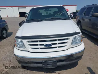 2001 Ford F-150 XLT z VIN 1FTRW07W81KB17508, wystawiony jako IAAI lot #42384253 z przebiegiem 278 756 mil mil oraz . Historia ofert i sprzedaży dostępna na DreamBid. Obrazek 12.
