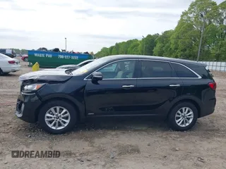 2019 Kia Sorento LX V6 with VIN 5XYPGDA55KG487091, listed as a IAAI auction lot 42007536 with 94,711 mi miles. Bid and sale history available at carsss.com. Image 14.