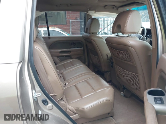 2006 Honda Pilot EX-L with VIN 2HKYF18516H528116, listed as a IAAI auction lot 41782324 with 245,280 mi miles and . Bid and sale history available at DreamBid. Image 8.