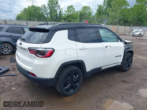 2021 Jeep Compass Altitude with VIN 3C4NJDBBXMT586529, listed as a IAAI auction lot 42296016 with 71,789 mi miles and . Bid and sale history available at DreamBid. Image 4.