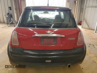 2004 MINI Hardtop with VIN WMWRC33474TJ58626, listed as a Copart auction lot 49226175 with 116,115 mi miles and Salvage Title. Bid and sale history available at DreamBid. Image 6.