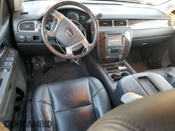 2013 GMC Yukon Denali with VIN 1GKS1EEF0DR205906, listed as a Copart auction lot 87969385 with 128,283 mi miles and Salvage Title. Bid and sale history available at carsss.com. Image 8.