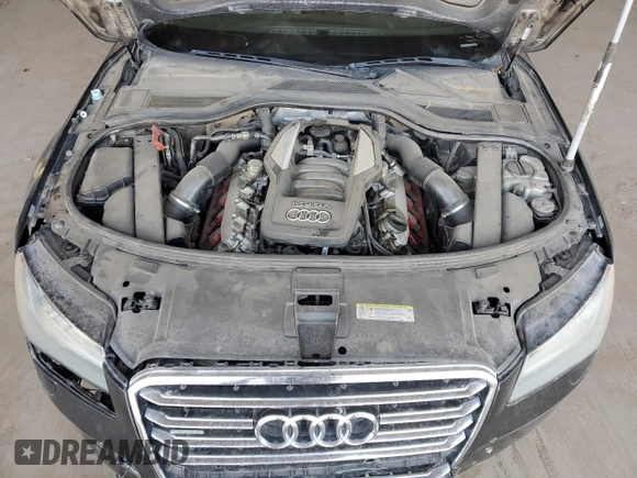 2011 Audi A8 z VIN WAURVAFD5BN019557, wystawiony jako Copart lot #54801035 z przebiegiem 148 688 mil mil oraz Tytuł czysty. Historia ofert i sprzedaży dostępna na DreamBid. Obrazek 11.