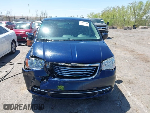 2014 Chrysler Town & Country Touring with VIN 2C4RC1BGXER131707, listed as a IAAI auction lot 42017348 with 120,790 mi miles and . Bid and sale history available at DreamBid. Image 12.