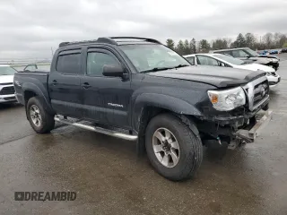 2009 Toyota Tacoma with VIN 3TMLU42N59M024127, listed as a Copart auction lot 51152195 with 213,513 mi miles and Salvage Title. Bid and sale history available at DreamBid. Image 4.
