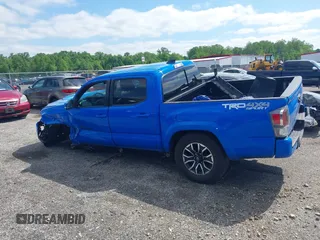 2021 Toyota Tacoma SR z VIN 3TMCZ5AN8MM374398, wystawiony jako IAAI lot #42297138 z przebiegiem 87 205 mil mil oraz . Historia ofert i sprzedaży dostępna na DreamBid. Obrazek 14.