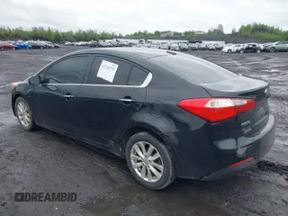 2014 Kia Forte EX z VIN KNAFX4A85E5046464, wystawiony jako IAAI lot #42326739 z przebiegiem 183 658 mil mil oraz . Historia ofert i sprzedaży dostępna na DreamBid. Obrazek 3.