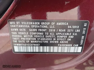2012 Volkswagen Passat SE w/Sunroof with VIN 1VWBH7A31CC076037, listed as a IAAI auction lot 41905200 with 141,809 mi miles. Bid and sale history available at carsss.com. Image 9.