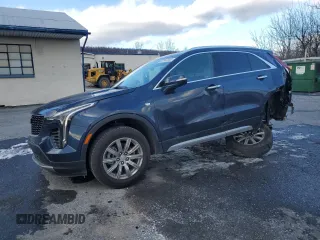 2021 Cadillac XT4 AWD Premium Luxury with VIN 1GYFZDR4XMF007080, listed as a Copart auction lot 87943335 with 36,379 mi miles and Salvage Title. Bid and sale history available at carsss.com. Image 1.