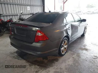 2012 Ford Fusion SE z VIN 3FAHP0HA9CR325249, wystawiony jako IAAI lot #41803339 z przebiegiem 203 650 mil mil oraz . Historia ofert i sprzedaży dostępna na DreamBid. Obrazek 4.