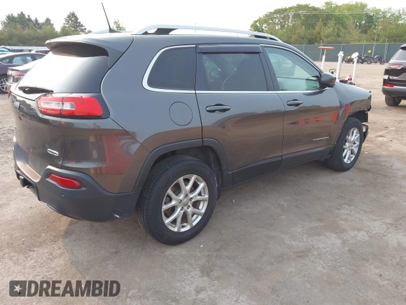 2017 Jeep Cherokee Latitude z VIN 1C4PJMCB8HW563256, wystawiony jako IAAI lot #42401873 z przebiegiem 258 934 mil mil oraz . Historia ofert i sprzedaży dostępna na DreamBid. Obrazek 4.