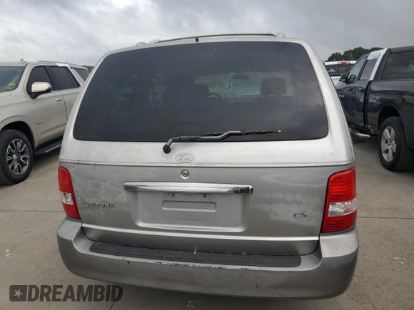 2004 Kia Sedona LX with VIN KNDUP131446570061, listed as a Copart auction lot 74222344 with 0 mi miles and Salvage Title. Bid and sale history available at carsss.com. Image 6.
