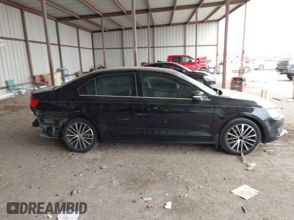 2012 Volkswagen Jetta Sedan SEL w/Sunroof with VIN 3VWLX7AJ5CM379634, listed as a IAAI auction lot 41634048 with 209,586 mi miles. Bid and sale history available at carsss.com. Image 14.