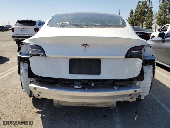 2020 Tesla Model 3 Standard Range Plus with VIN 5YJ3E1EA4LF631538, listed as a Copart auction lot 51926995 with 91,357 mi miles and Salvage Title. Bid and sale history available at carsss.com. Image 6.