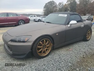 2003 Honda S2000 with VIN JHMAP11483T005861, listed as a Copart auction lot 81335964 with 129,678 mi miles and Salvage Title. Bid and sale history available at DreamBid. Image 1.