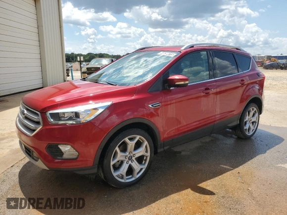2019 Ford Escape Titanium z VIN 1FMCU0J97KUB20612, wystawiony jako Copart lot #64638415 z przebiegiem 100 102 mil mil oraz Czysty tytuł • Clean title. Historia ofert i sprzedaży dostępna na DreamBid. Obrazek 1.