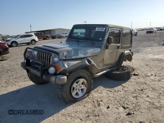 2003 Jeep Wrangler Rubicon z VIN 1J4FA69S73P339925, wystawiony jako Copart lot #75341094 z przebiegiem Nie podano mil oraz Szkoda całkowita • Salvage title. Historia ofert i sprzedaży dostępna na DreamBid. Obrazek 1.