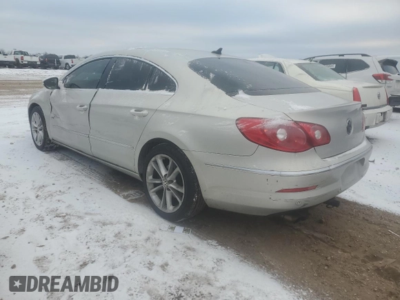 2010 Volkswagen CC with VIN WVWHP9AN7AE547929, listed as a Copart auction lot 88708825 with 158,812 mi miles and Salvage Title. Bid and sale history available at DreamBid. Image 2.