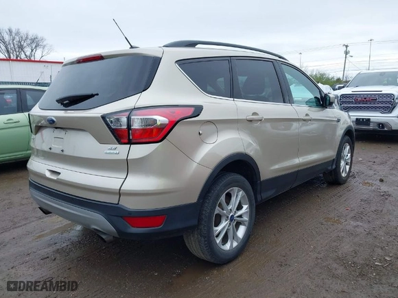 2017 Ford Escape SE with VIN 1FMCU0G99HUE68587, listed as a IAAI auction lot 41924307 with 89,609 mi miles. Bid and sale history available at carsss.com. Image 4.