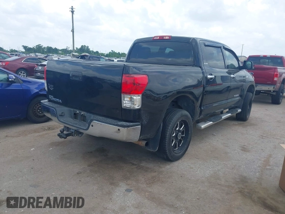 2013 Toyota Tundra Limited with VIN 5TFFY5F19DX142652, listed as a IAAI auction lot 42165369 with 152,286 mi miles and . Bid and sale history available at DreamBid. Image 4.