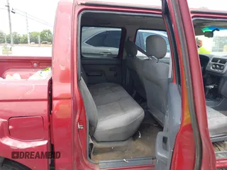 2001 Nissan Frontier SE with VIN 1N6ED27T61C302279, listed as a IAAI auction lot 42642272 with 137,066 mi miles and . Bid and sale history available at DreamBid. Image 8.