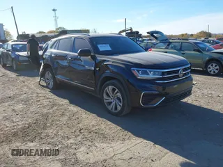 2020 Volkswagen Atlas SE with VIN 1V26E2CA5LC229061, listed as a IAAI auction lot 40694949 with 70,757 mi miles and . Bid and sale history available at DreamBid. Image 1.