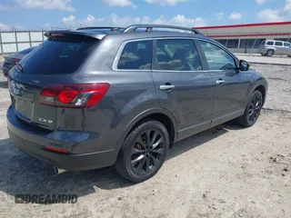2014 Mazda CX-9 Grand Touring with VIN JM3TB2DA4E0436340, listed as a IAAI auction lot 42442249 with 102,856 mi miles and . Bid and sale history available at DreamBid. Image 4.