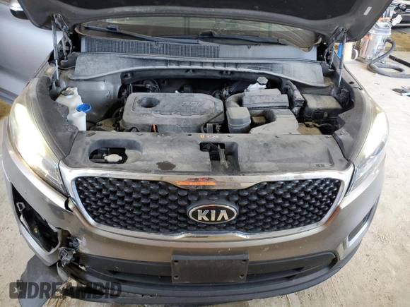 2017 Kia Sorento LX z VIN 5XYPGDA33HG293392, wystawiony jako Copart lot #62642604 z przebiegiem 73 242 mil mil oraz Szkoda całkowita • Salvage title. Historia ofert i sprzedaży dostępna na DreamBid. Obrazek 12.