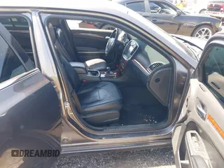 2014 Chrysler 300 with VIN 2C3CCAAG3EH237157, listed as a IAAI auction lot 41986053 with 61,372 mi miles and . Bid and sale history available at DreamBid. Image 5.