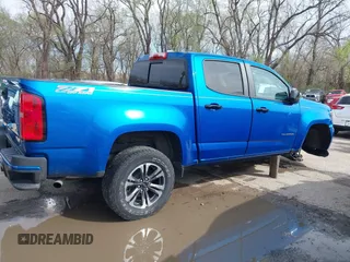 2021 Chevrolet Colorado 4WD Z71 z VIN 1GCGTDEN4M1212479, wystawiony jako IAAI lot #41937713 z przebiegiem 56 164 mil mil oraz . Historia ofert i sprzedaży dostępna na DreamBid. Obrazek 14.