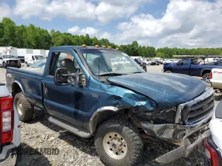 1999 Ford F-250 XL with VIN 1FTNF21FXXEB26561, listed as a Copart auction lot 54303275 with 219,108 mi miles and Salvage title. Bid and sale history available at DreamBid. Image 4.